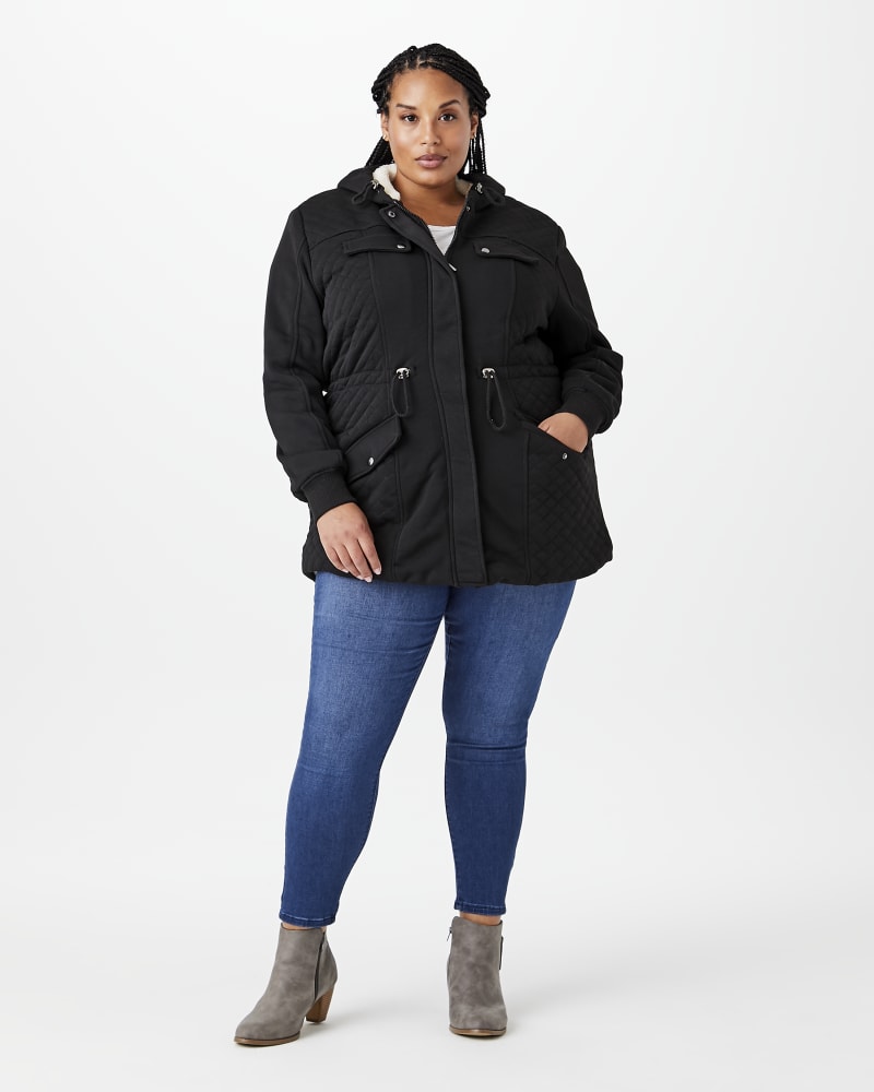 Plus size model with hourglass body shape wearing Primrose Quilted Hooded Jacket by Prescott New York | Dia&Co | dia_product_style_image_id:144368